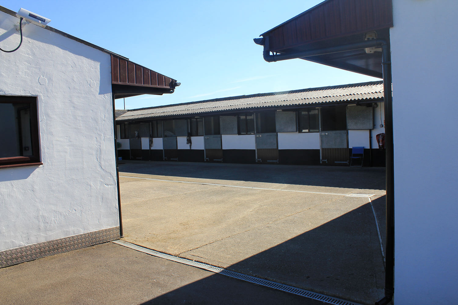 Substantial doors to accomodate large horses with metal covering and frames